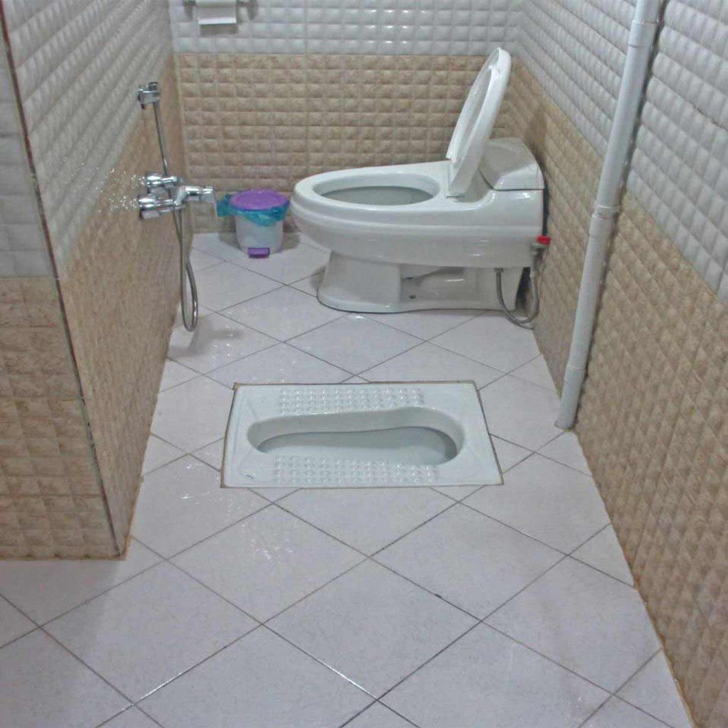 رفع گرفتگی توالت ایرانی بازکردن توالت ایرانی