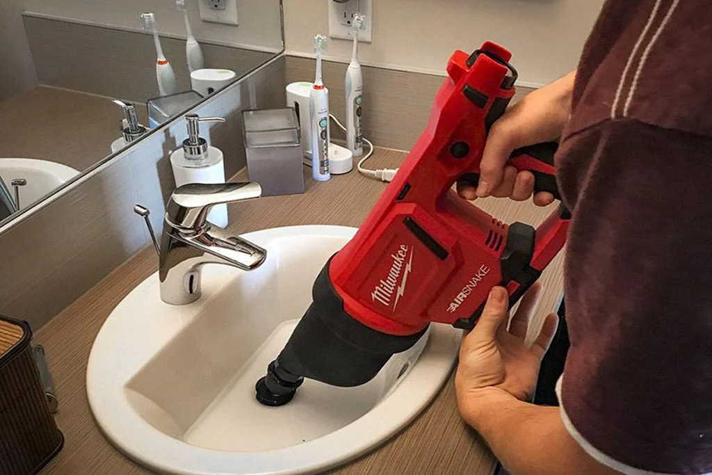 بازکردن گرفتگی لوله روشویی تهران